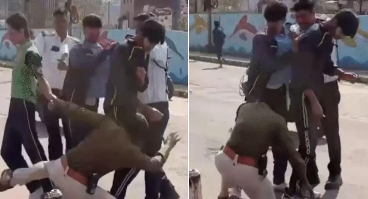 छात्रों की लड़ाई रोकने पहुंचे तो धक्का देकर गिराया, देखें VIRAL VIDEO